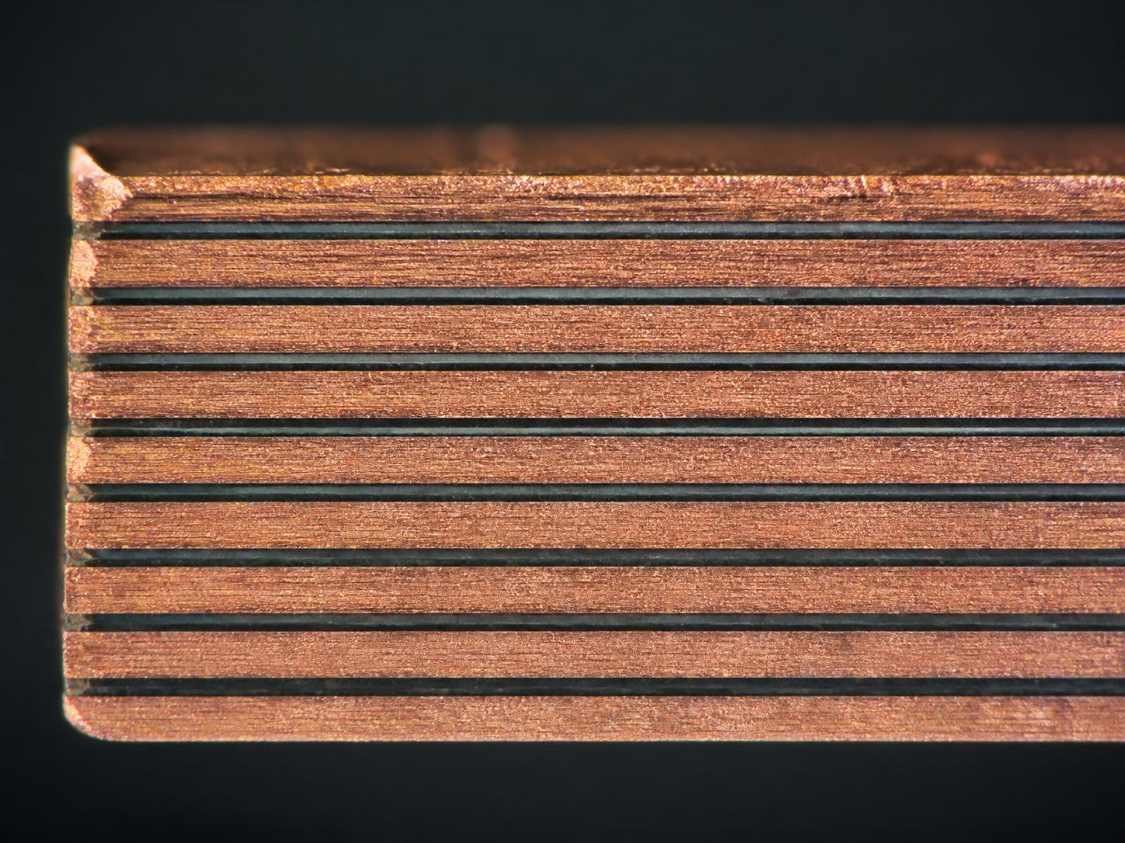 Cross-section of laminated copper conductors with dielectric insulation